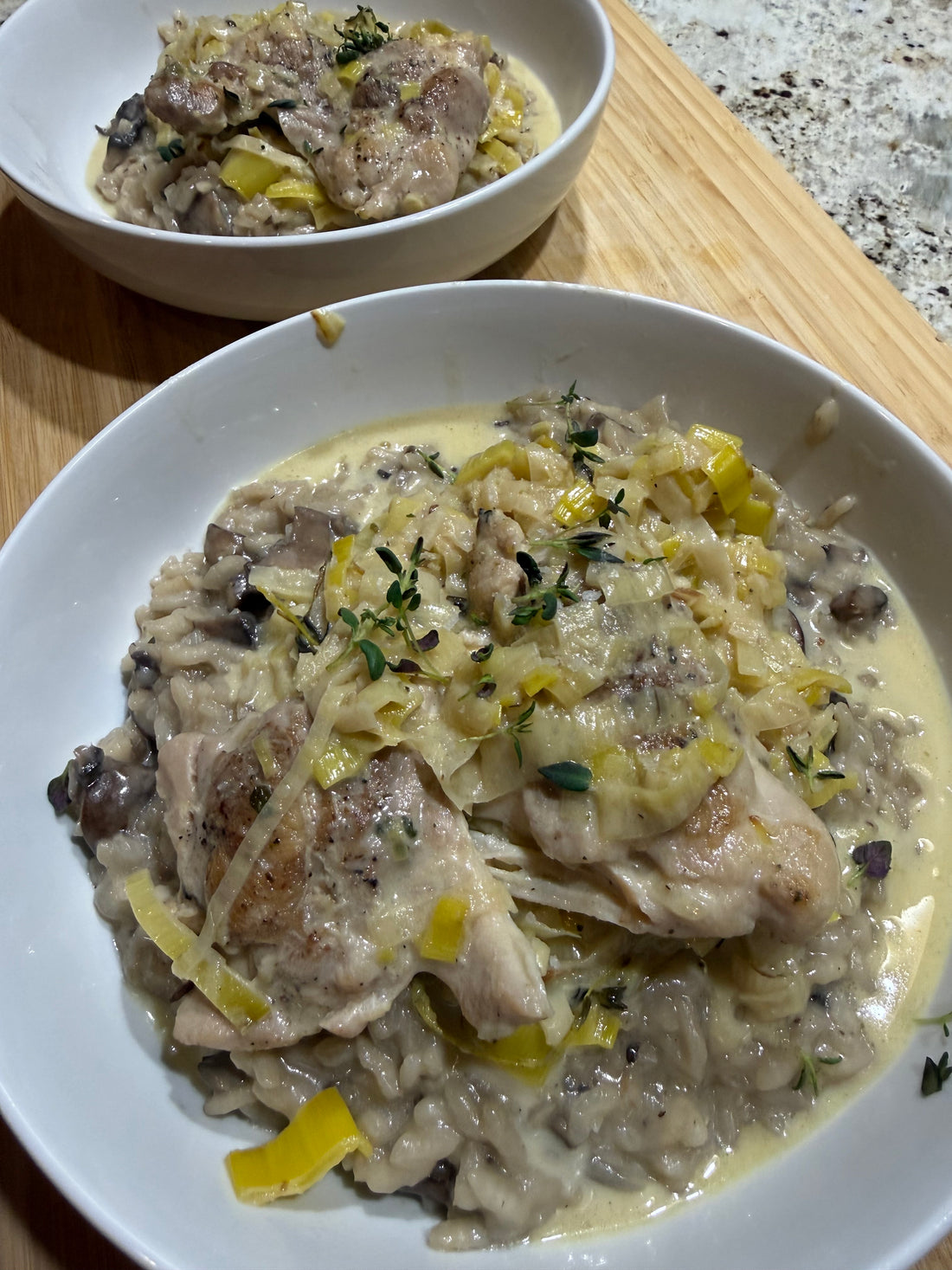 Pan-Roasted Chicken Thighs with White Wine Leek Sauce  with Parmesan Risotto and Sautéed Mushrooms