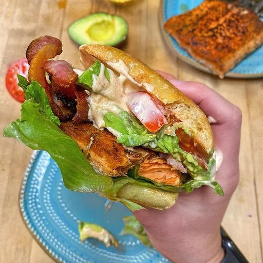 Delicious Salmon BLT Sandwich with fresh ingredients including wild sockeye salmon, crispy bacon, and avocado.